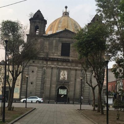 Church Mexico City subsiding to the right