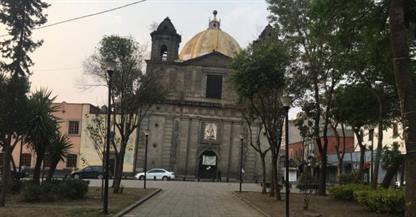 Church Mexico City subsiding to the right